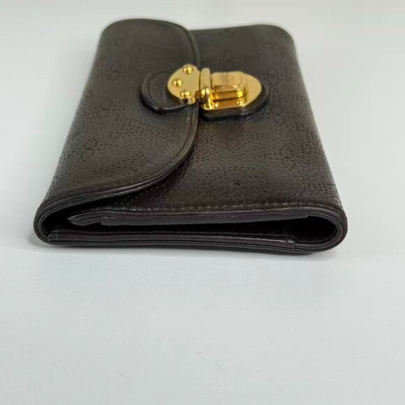 Louis Vuitton Black Monogram Canvas Wallet with Gold Hinge Detail Elegant Design - Picture 4 of 7